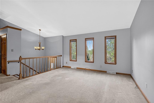 228 Bowman Rd, South Fayette, PA 15017 - carpeted spare room featuring a chandelier and lofted ceiling