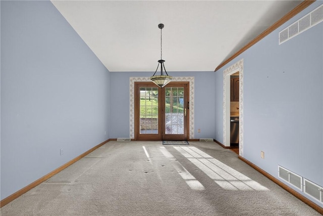 228 Bowman Rd, South Fayette, PA 15017 - unfurnished dining area featuring vaulted ceiling and carpet flooring