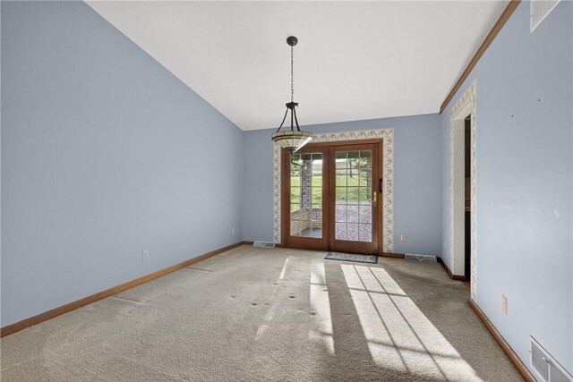 228 Bowman Rd, South Fayette, PA 15017 - empty room featuring carpet floors, lofted ceiling, and french doors