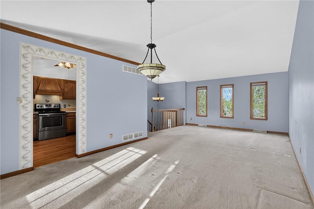 228 Bowman Rd, South Fayette, PA 15017 - unfurnished living room with carpet floors and lofted ceiling