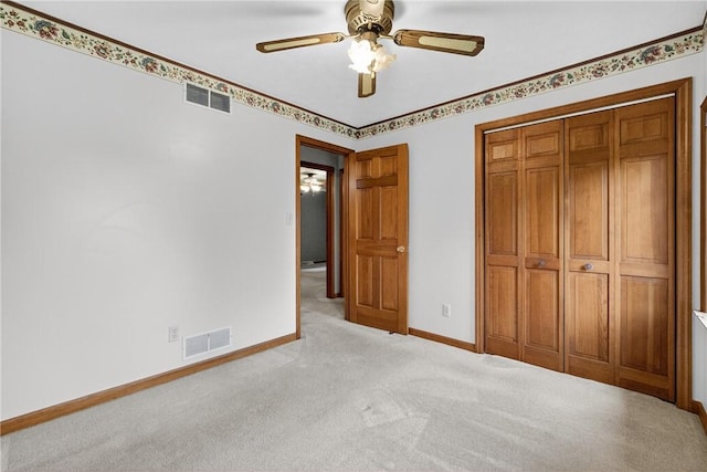 228 Bowman Rd, South Fayette, PA 15017 - unfurnished bedroom featuring carpet flooring, a closet, and a ceiling fan