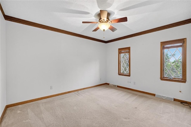 228 Bowman Rd, South Fayette, PA 15017 - unfurnished room featuring light colored carpet, healthy amount of natural light, ceiling fan, and crown molding