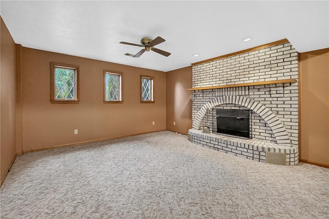 228 Bowman Rd, South Fayette, PA 15017 - unfurnished living room with ceiling fan, carpet, and a fireplace