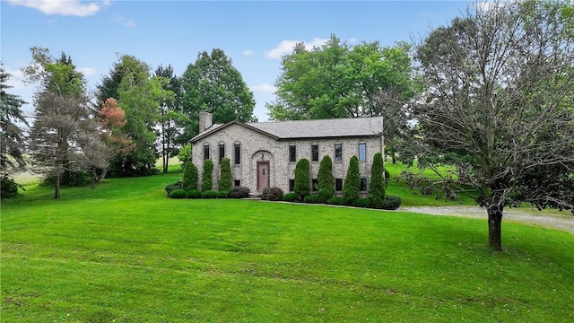 228 Bowman Rd, South Fayette, PA 15017 - view of front of house featuring a chimney and a front lawn
