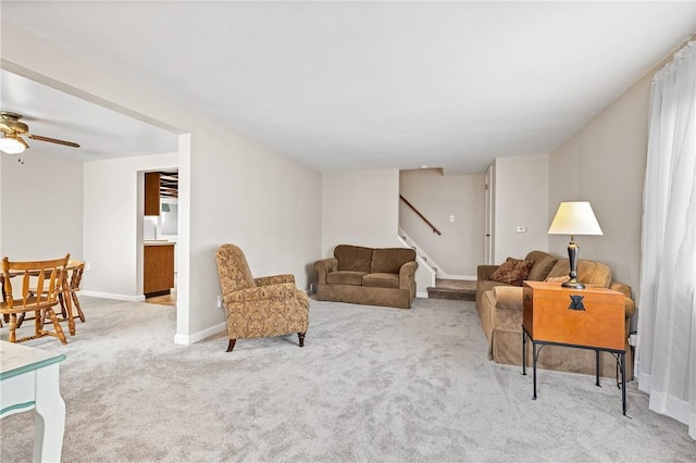 4457 Woodhill Dr, Munhall, PA 15120 - carpeted living room with stairs and ceiling fan