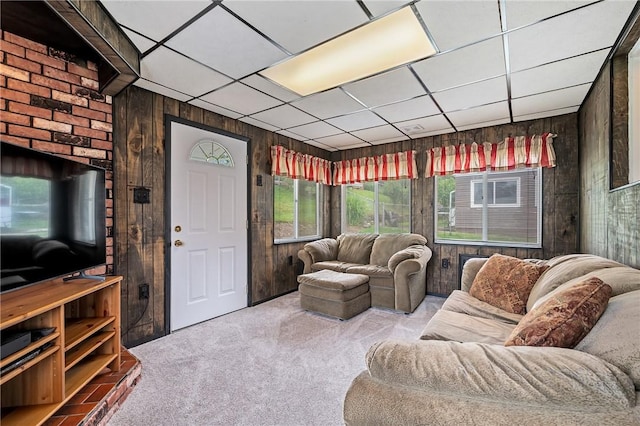 4457 Woodhill Dr, Munhall, PA 15120 - living room featuring wooden walls, carpet, and a drop ceiling