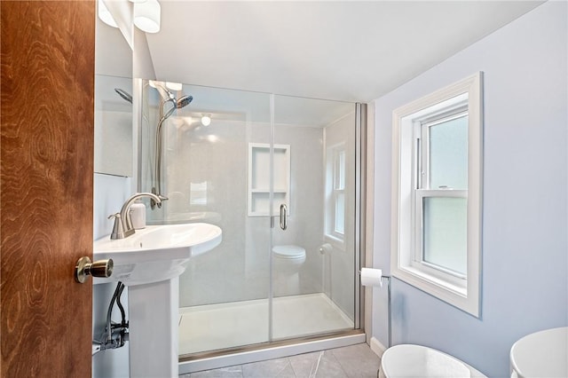 4457 Woodhill Dr, Munhall, PA 15120 - full bath with a stall shower and tile patterned flooring