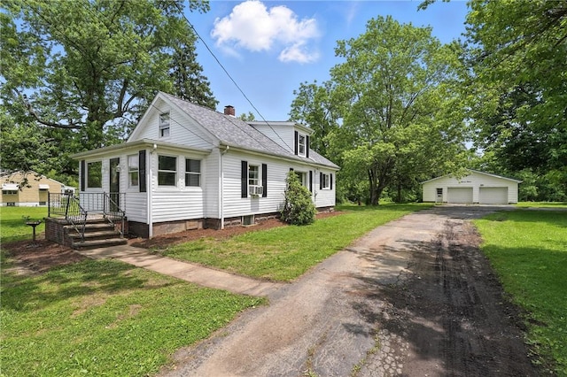1112 Grigsby, Shenango Twp Law, PA 16101 - view of front of home featuring a detached garage, an outbuilding, and a front yard
