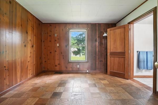 1112 Grigsby, Shenango Twp Law, PA 16101 - spare room with wood walls and light floors