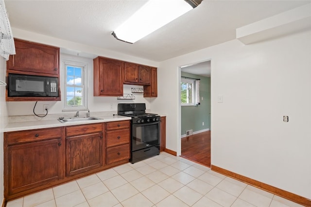200 Anderson Pl, Shaler, PA 15116 - kitchen featuring black appliances and light countertops