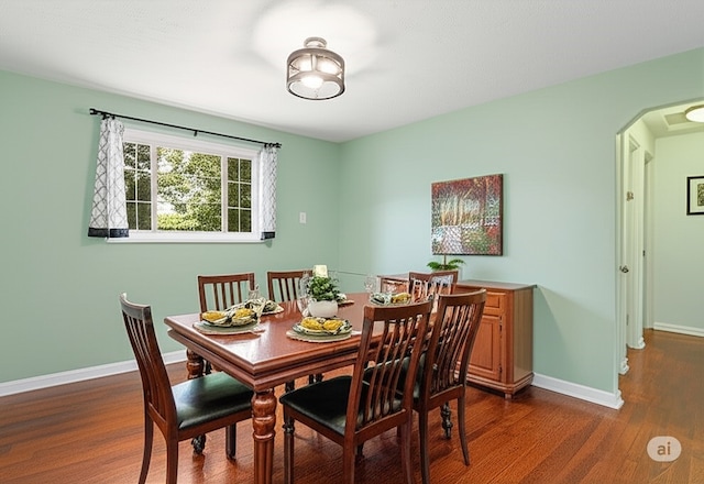 200 Anderson Pl, Shaler, PA 15116 - dining room featuring dark wood-type flooring and arched walkways