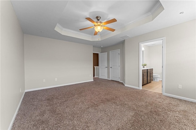 2804 Pointe View Dr, Adams Twp, PA 16046 - unfurnished bedroom featuring a tray ceiling, light colored carpet, ornamental molding, connected bathroom, and a ceiling fan
