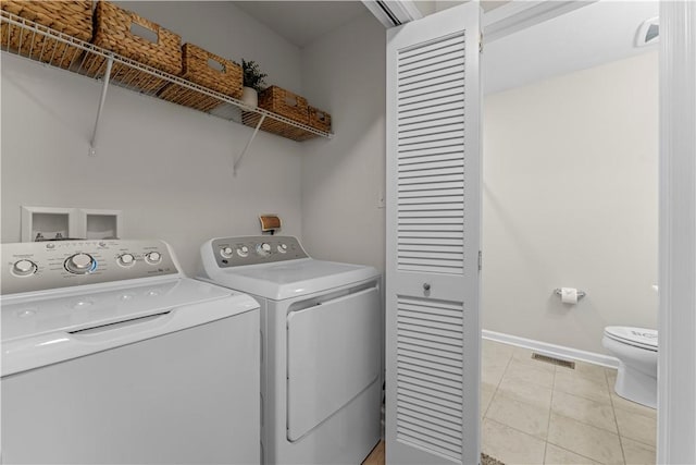 2804 Pointe View Dr, Adams Twp, PA 16046 - washroom featuring separate washer and dryer and light tile patterned flooring