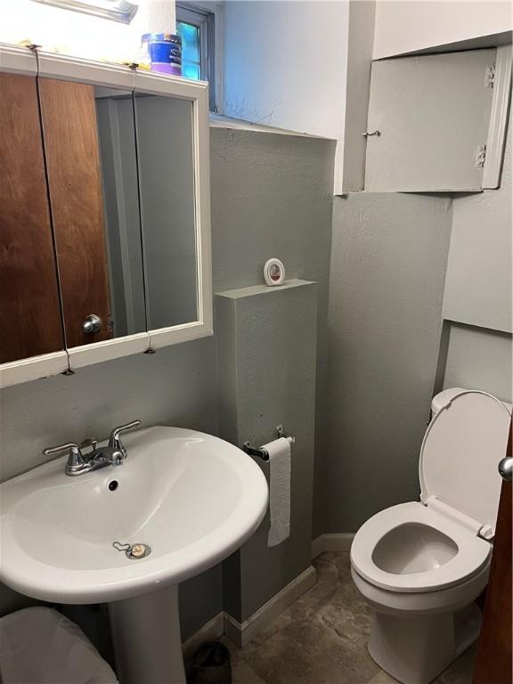 38 Rostock St, Spring Hill, PA 15212 - half bathroom with baseboards and toilet