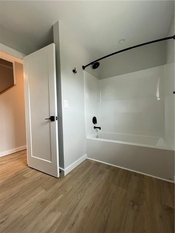 843 Ledlie St, Hill District, PA 15219 - bathroom with wood finished floors and  shower combination