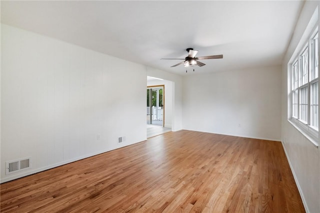 4421 Logan Ferry Rd, Murrysville, PA 15668 - unfurnished room with light wood finished floors and ceiling fan