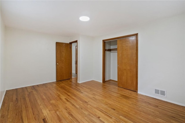 4421 Logan Ferry Rd, Murrysville, PA 15668 - unfurnished bedroom with light wood-type flooring and a closet