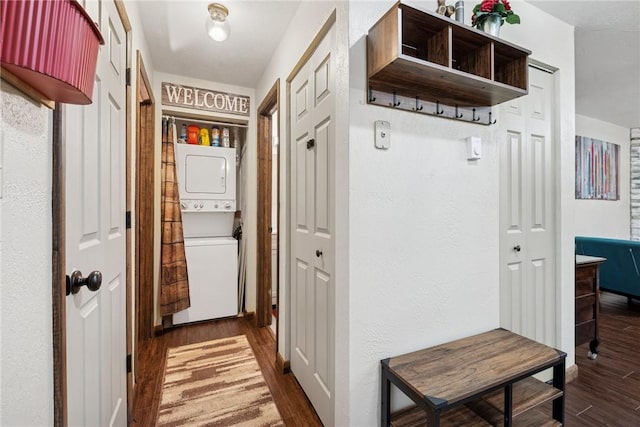 1147 Tanyard Ln, Hidden Valley, PA 15502 - corridor with stacked washer and clothes dryer and dark wood finished floors