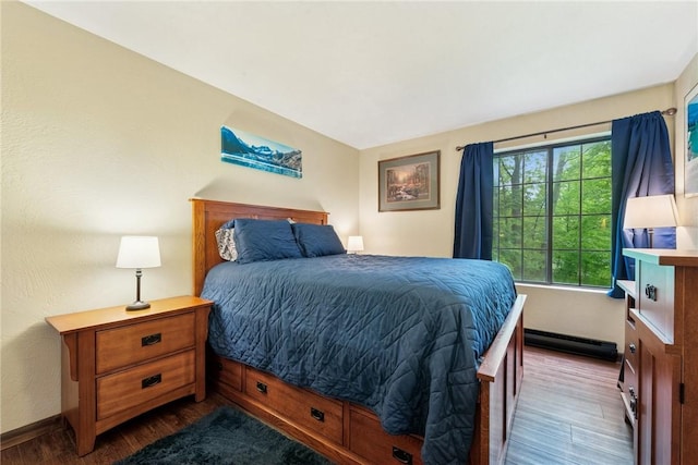 1147 Tanyard Ln, Hidden Valley, PA 15502 - bedroom with dark wood-style flooring and a baseboard radiator