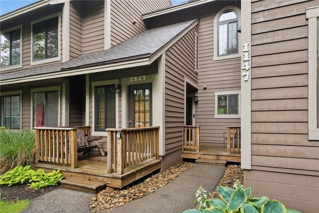 1147 Tanyard Ln, Hidden Valley, PA 15502 - view of exterior entry featuring roof with shingles and covered porch