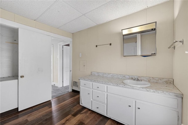 1201 3rd Ave, Beaver Falls, PA 15010 - bathroom featuring wood finished floors, vanity, and a paneled ceiling