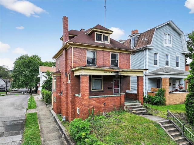 1201 3rd Ave, Beaver Falls, PA 15010 - view of front of house with brick siding, a chimney, and covered porch