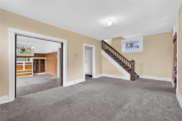 1201 3rd Ave, Beaver Falls, PA 15010 - unfurnished living room featuring carpet, stairway, crown molding, and a chandelier