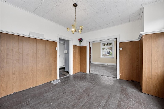 1201 3rd Ave, Beaver Falls, PA 15010 - unfurnished dining area with a chandelier, wood finished floors, and ornamental molding