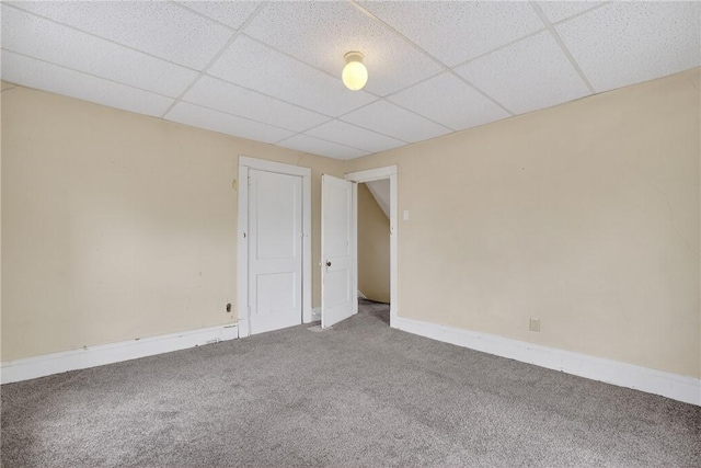 1201 3rd Ave, Beaver Falls, PA 15010 - carpeted empty room featuring a drop ceiling and baseboards