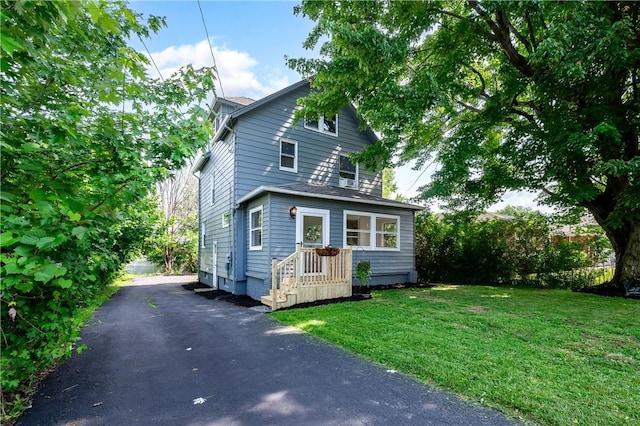 1155 French St, Sharon, PA 16146 - view of front of home with a front yard and asphalt driveway