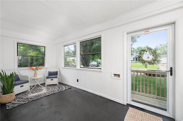 1155 French St, Sharon, PA 16146 - sitting room with finished concrete floors, plenty of natural light, and ornamental molding