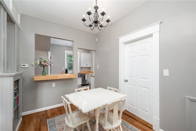 1155 French St, Sharon, PA 16146 - dining room with a chandelier and wood finished floors