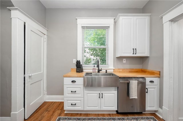 1155 French St, Sharon, PA 16146 - kitchen with dishwasher, wooden counters, wood finished floors, and white cabinetry