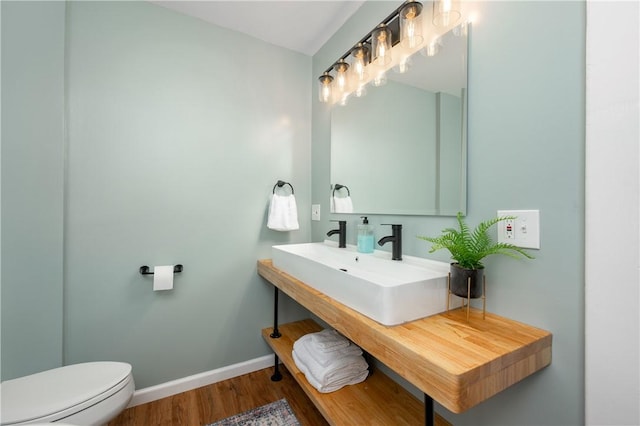 1155 French St, Sharon, PA 16146 - bathroom with wood finished floors and toilet