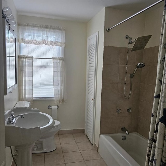 405 Penn Ave, New Brighton, PA 15061 - full bathroom with tile patterned flooring, shower / tub combo with curtain, plenty of natural light, and a closet