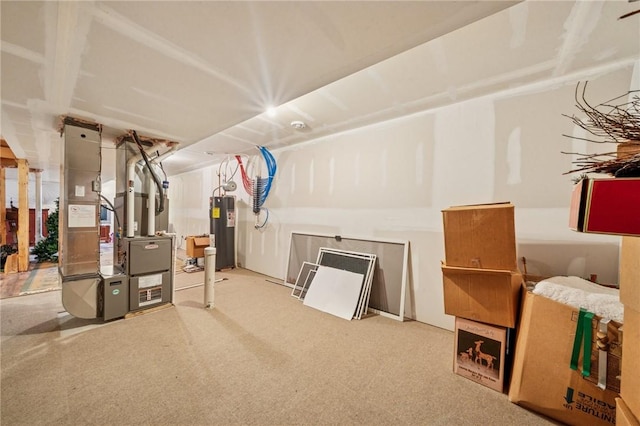 517 Callie Ct, Rostraver, PA 15089 - basement featuring electric water heater, heating unit, and carpet flooring