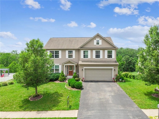 517 Callie Ct, Rostraver, PA 15089 - traditional-style home with a garage, driveway, and a front yard