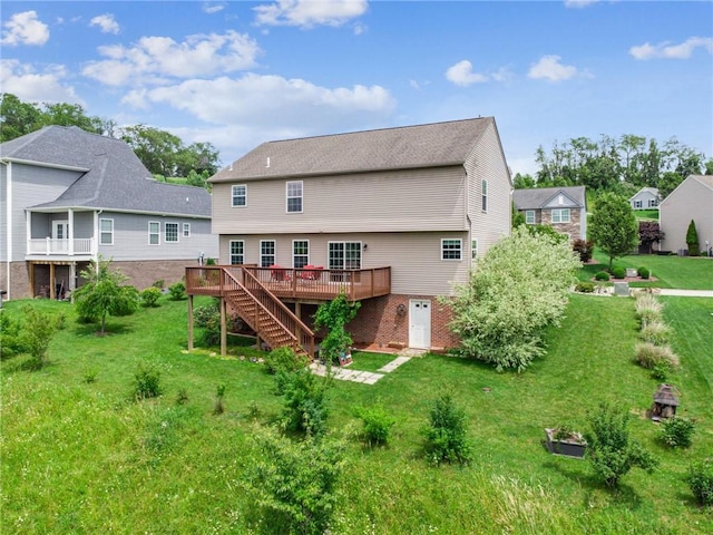 517 Callie Ct, Rostraver, PA 15089 - back of house featuring a wooden deck, stairs, and a lawn