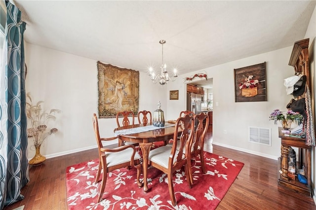 517 Callie Ct, Rostraver, PA 15089 - dining space with a chandelier and hardwood / wood-style flooring