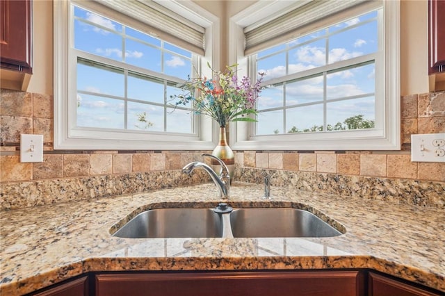 517 Callie Ct, Rostraver, PA 15089 - kitchen view of tasteful backsplash and light stone counters