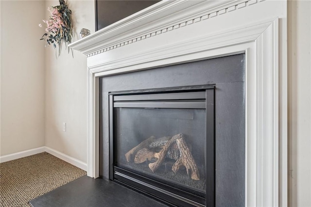 517 Callie Ct, Rostraver, PA 15089 - detailed view of a glass covered fireplace and carpet