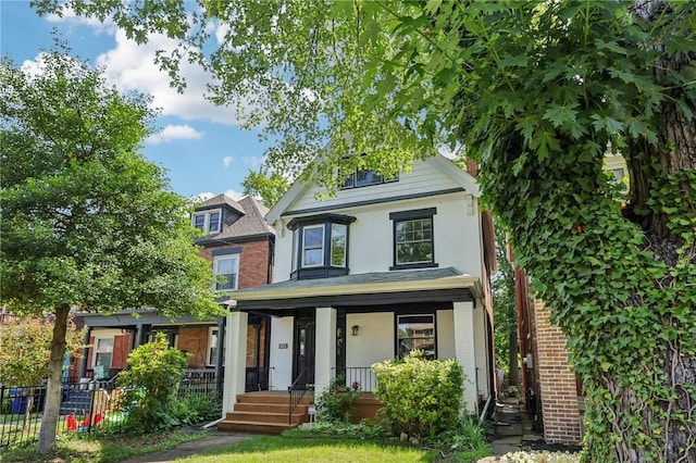 515 Peebles St, Wilkinsburg, PA 15221 - view of front of property with a porch and brick siding