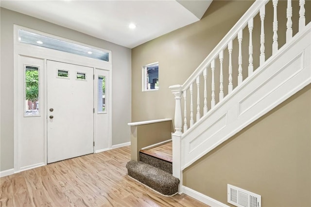 515 Peebles St, Wilkinsburg, PA 15221 - entrance foyer featuring stairway, wood finished floors, and recessed lighting