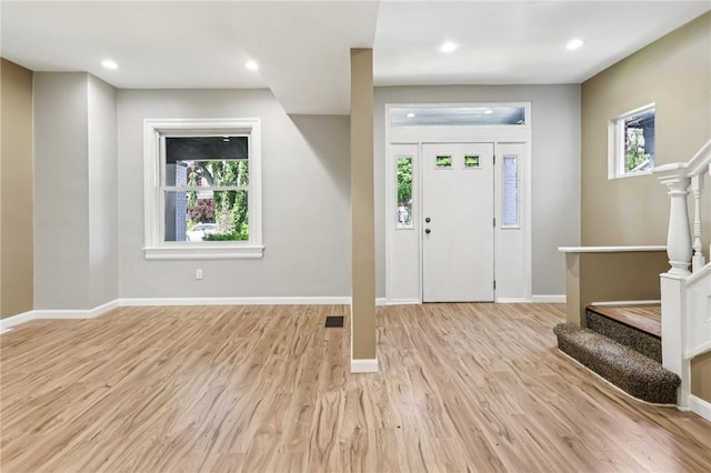 515 Peebles St, Wilkinsburg, PA 15221 - foyer entrance with stairs, light wood-style floors, and recessed lighting