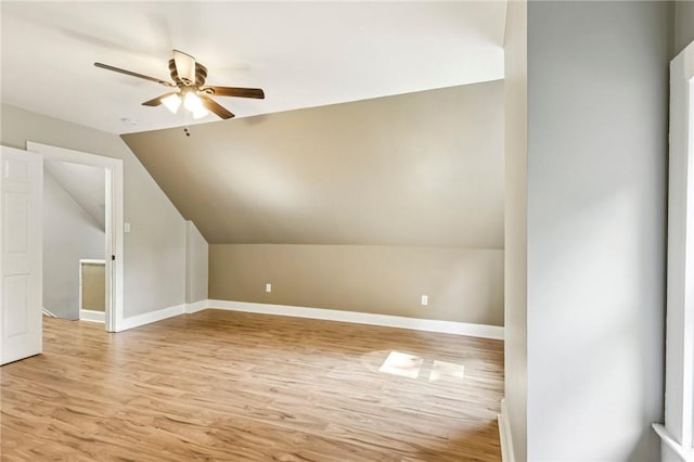 515 Peebles St, Wilkinsburg, PA 15221 - additional living space with light wood finished floors, a ceiling fan, and lofted ceiling