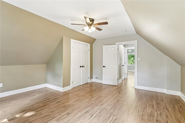 515 Peebles St, Wilkinsburg, PA 15221 - bonus room featuring ceiling fan, lofted ceiling, and light wood-type flooring