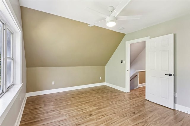515 Peebles St, Wilkinsburg, PA 15221 - additional living space featuring light wood-style floors, vaulted ceiling, and a ceiling fan