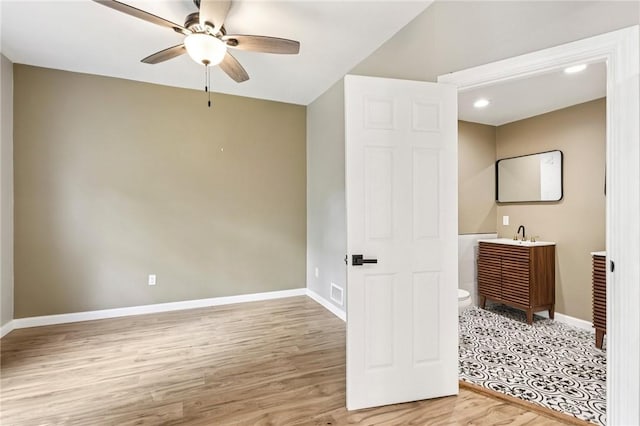 515 Peebles St, Wilkinsburg, PA 15221 - unfurnished bedroom with wood finished floors, recessed lighting, and ceiling fan
