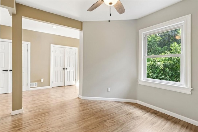 515 Peebles St, Wilkinsburg, PA 15221 - empty room with ceiling fan and light wood finished floors