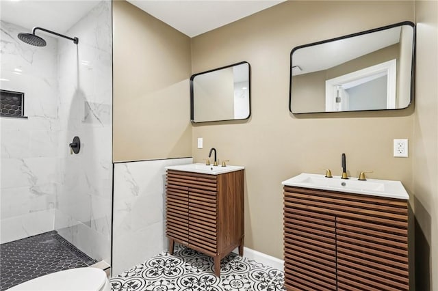 515 Peebles St, Wilkinsburg, PA 15221 - bathroom with a marble finish shower, two vanities, and tile patterned floors